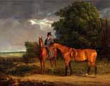 groom mounted on a chestnut hunter he holds a bay hunter